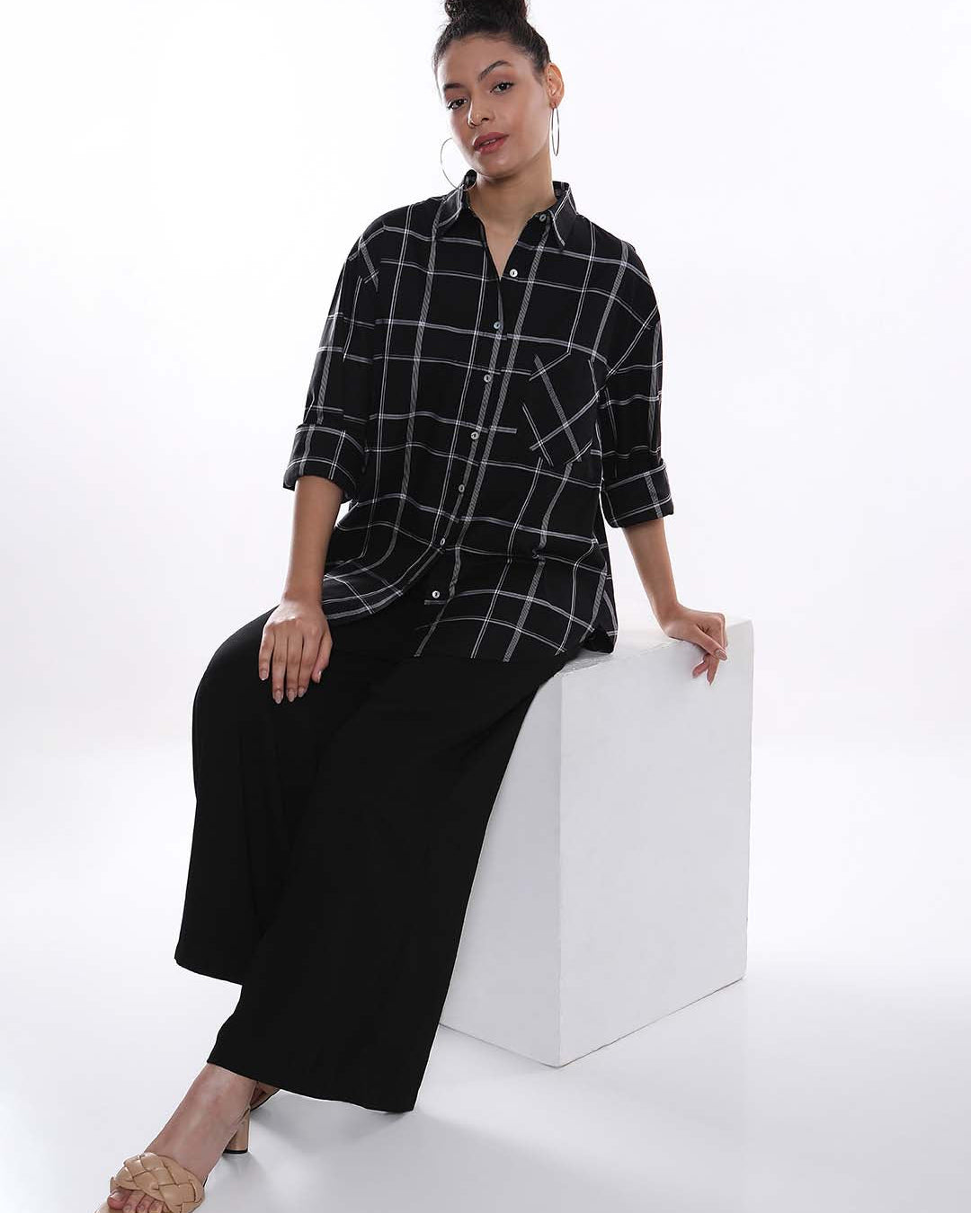 Alivia Black Checks Oversized Shirt for Women - Brussels Fit from GAZILLION - Seated Stylised Look