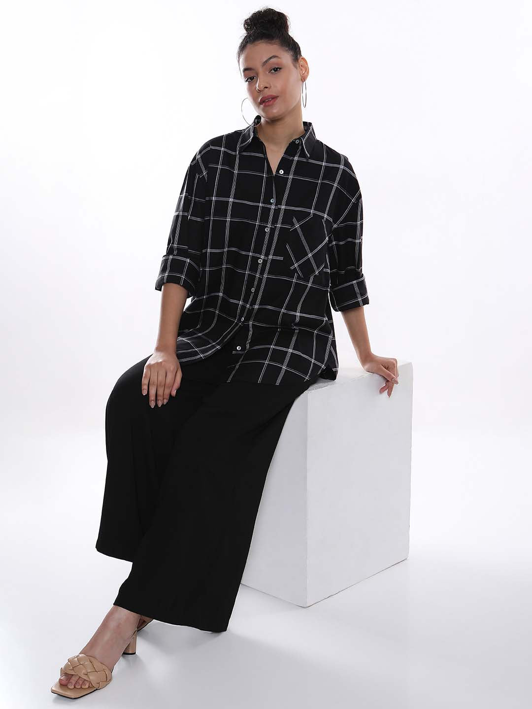 Alivia Black Checks Oversized Shirt for Women - Brussels Fit from GAZILLION - Seated Stylised Look