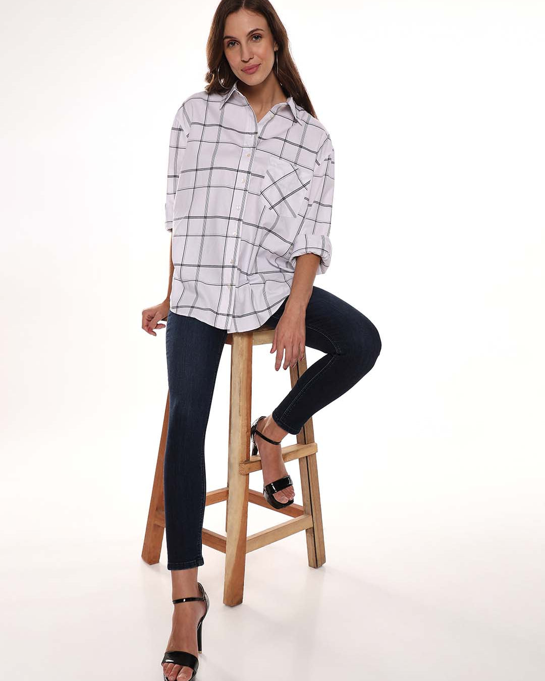 Alivia White Checks Oversized Shirt for Women from GAZILLION - Seated Stylised Look