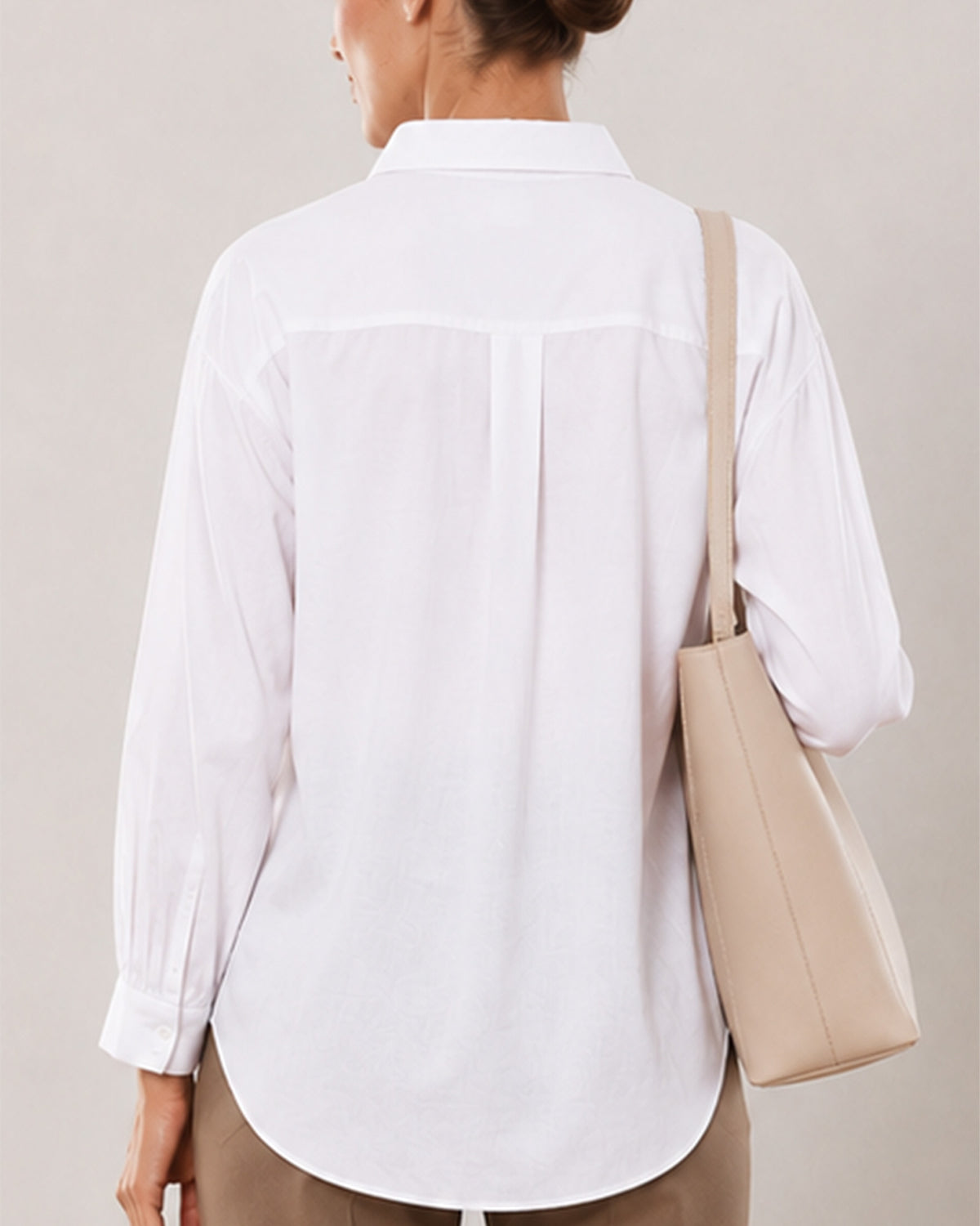 Alexis white cotton linen shirt back yoke close-up with the drop shoulder seam