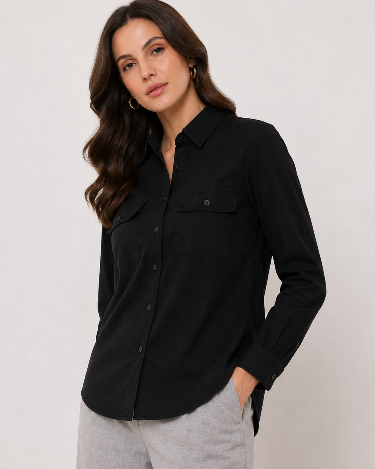 Allaya black denim shirt waist up front with the 2 flap utility pockets
