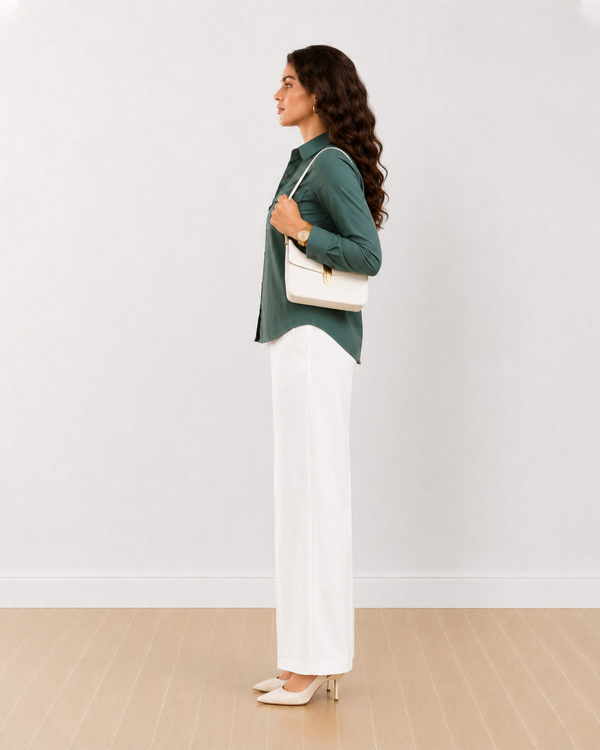 Analia bottle green corduroy utility shirt side profile with the curved hem