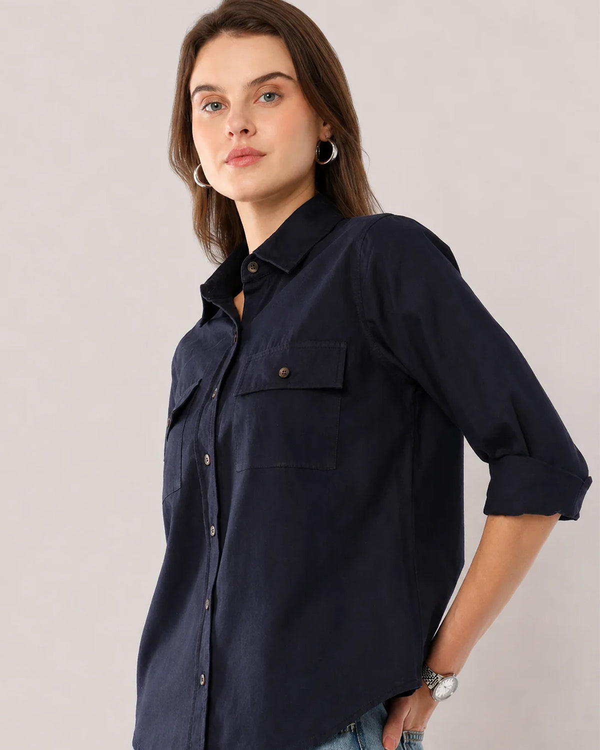 Analia navy blue corduroy utility shirt, angled view with the flap utility pocket