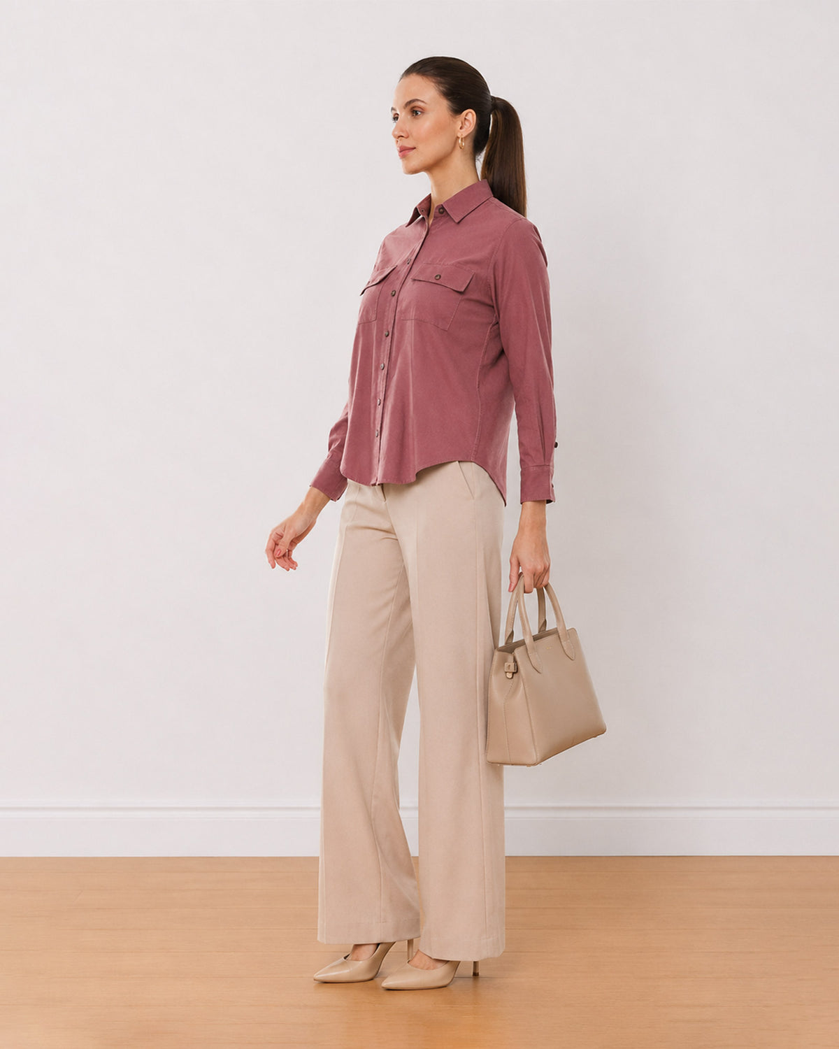 Analia onion pink cotton corduroy shirt, angled back view with the long length
