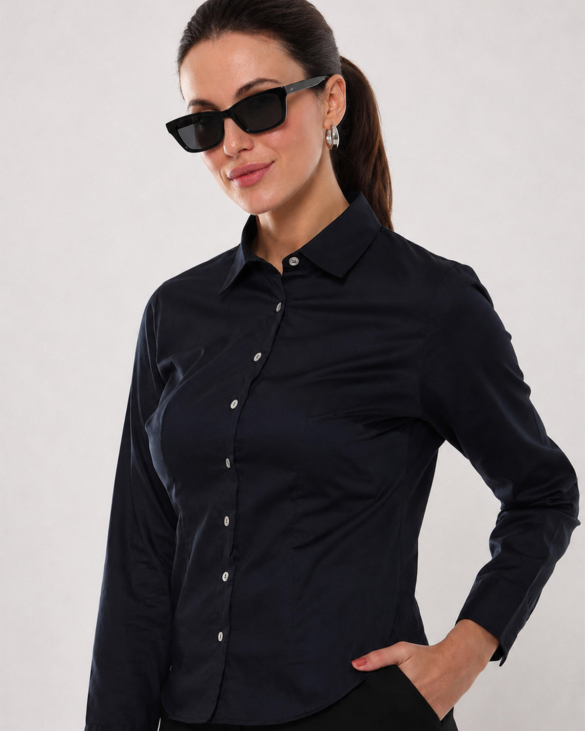 Armani bright navy cotton shirt waist up front with the contrast white buttons
