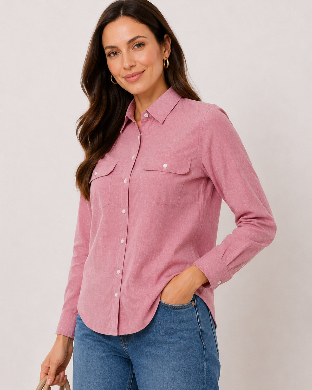 Aura pink cotton chambray shirt waist up front with the 2 flap utility pockets