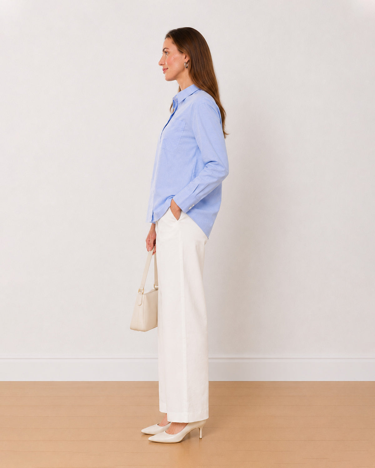 Ava sky blue Oxford cotton oversized shirt side profile with the relaxed fit