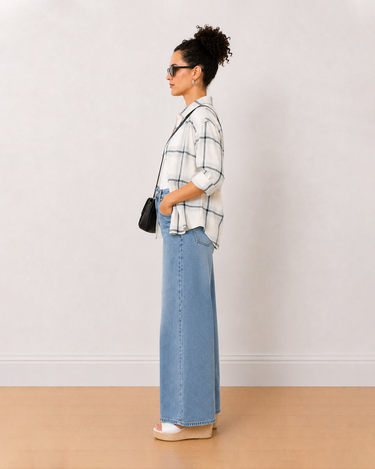 Barbara powder blue brushed cotton checks shirt side view worn open with the curved hem