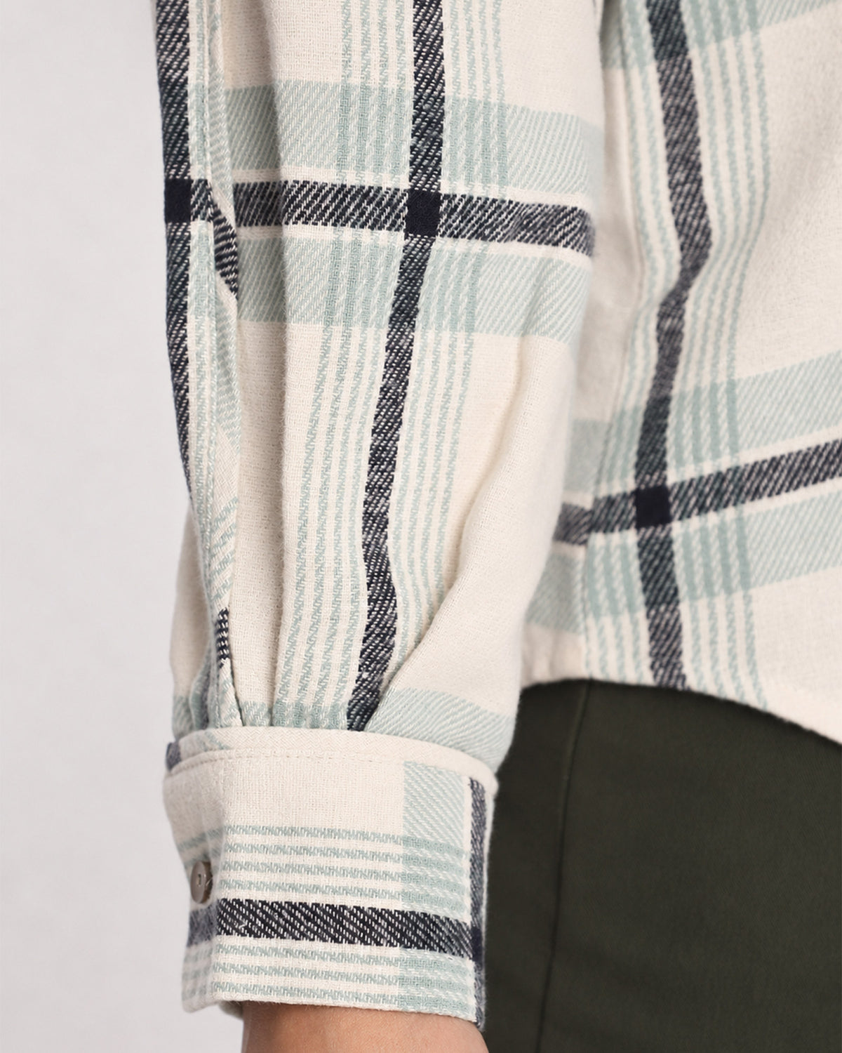 Barbara sage green 100% cotton checks shirt cuff detail with the sleeve rolled back