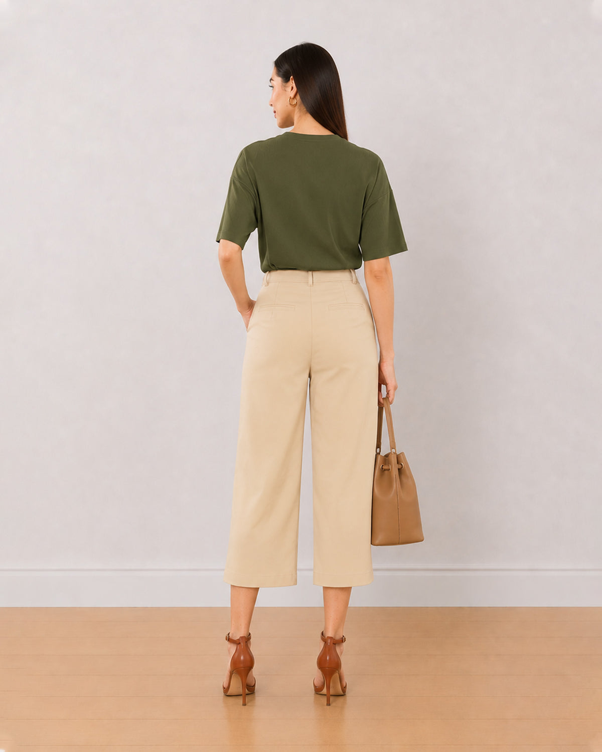 Bella beige 3/4th straight pants back view with the medium waist and straight leg