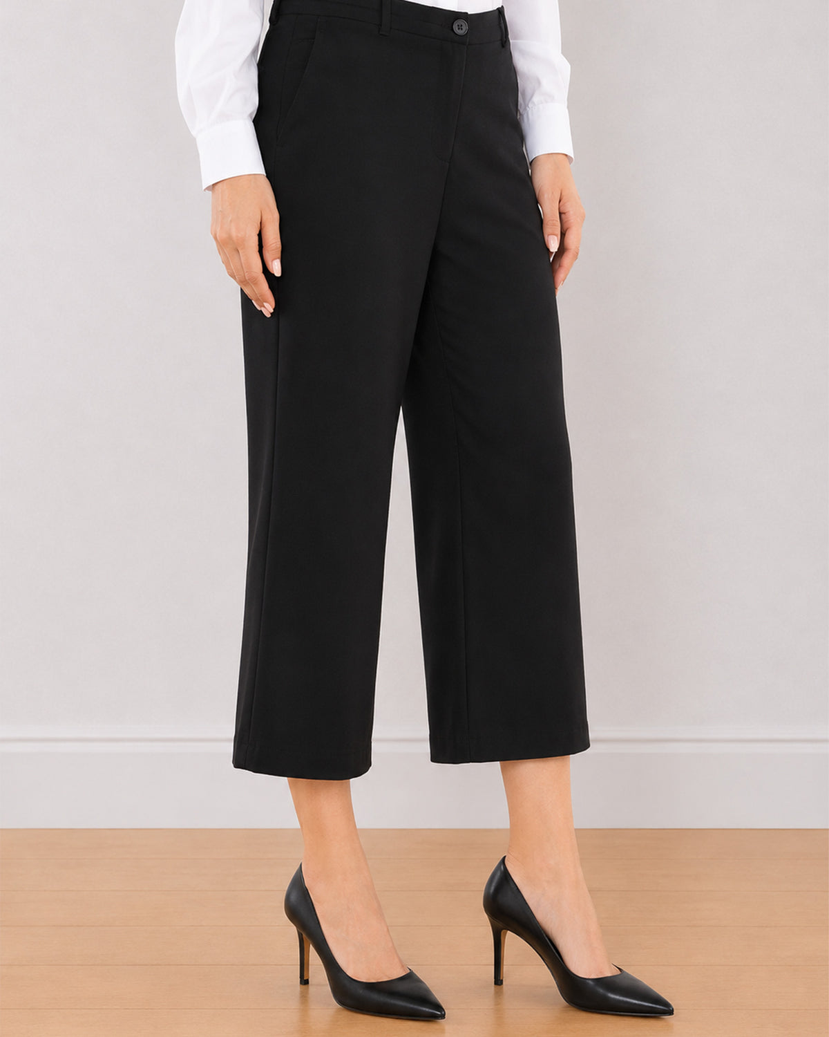 Bella black medium waist pants front detail with belt loops and 2 side cross pockets