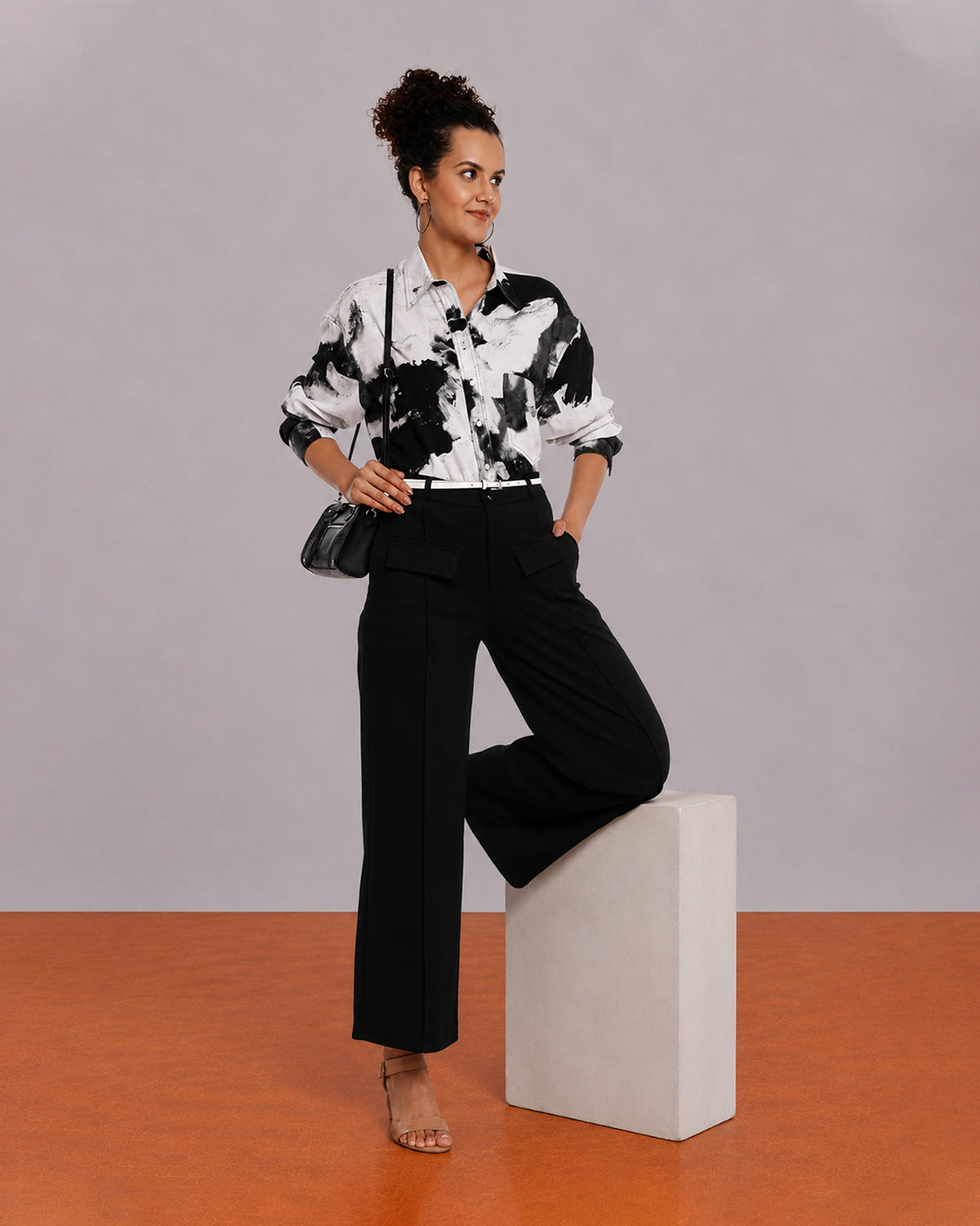 Benna black and white floral print shirt, angled full length view of the oversized fit