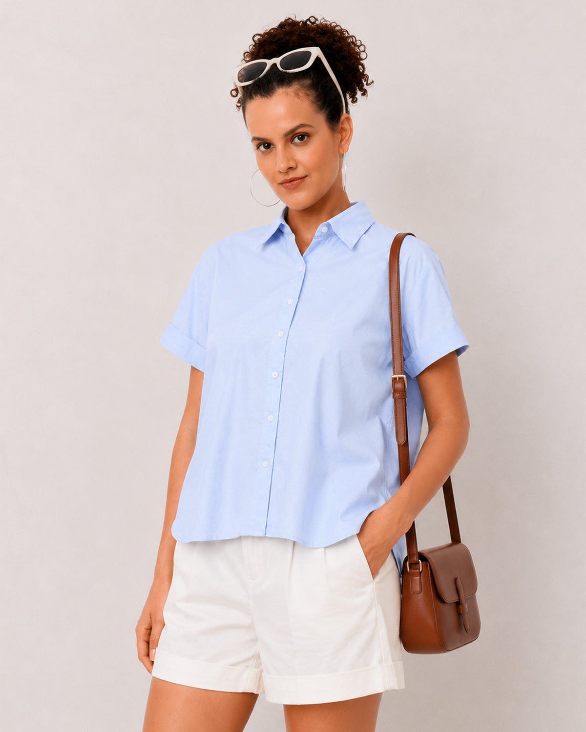 Bershka sky blue shirt front detail with the turn up cuffs and the curved hem