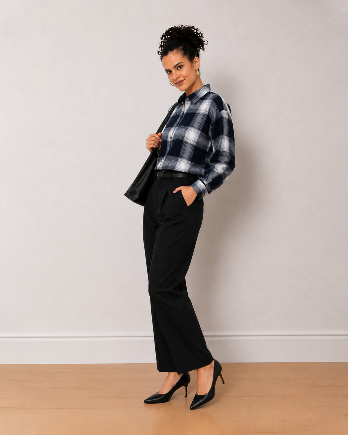 Bianca navy blue brushed cotton checks shirt, angled front view with the curved hem