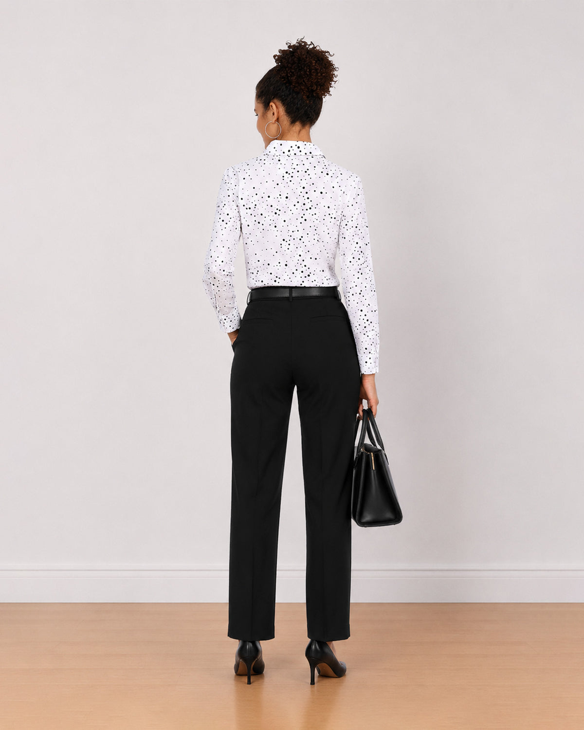 Brenda black and white polka dots shirt back view with the drop shoulder