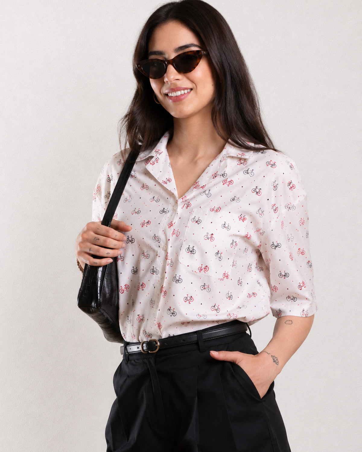 Cecelia white printed cropped shirt angled front view worn tucked in