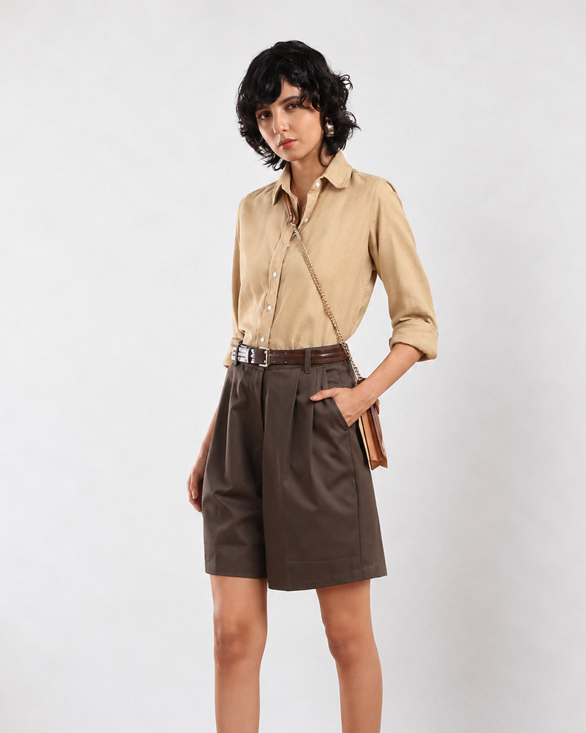 Side view of Charlie beige 100% cotton formal shirt worn tucked in for office wear