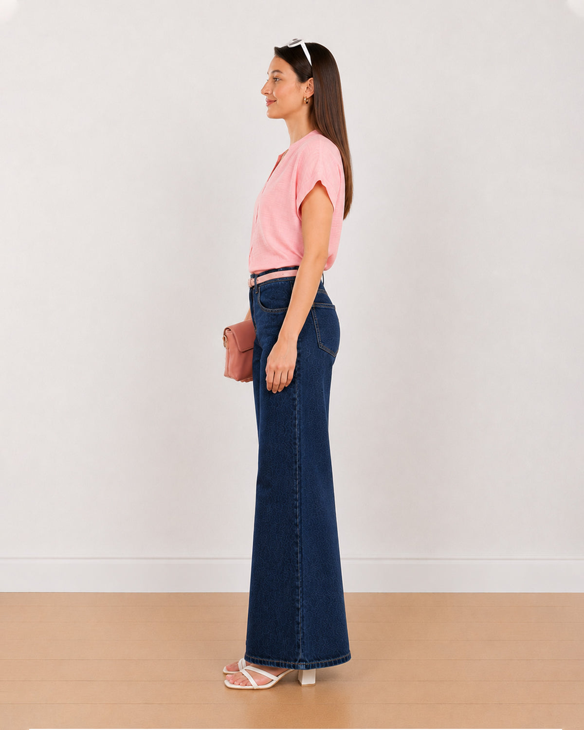 Side view of Chloe pink stylish formal top worn tucked in with a boxy relaxed fit