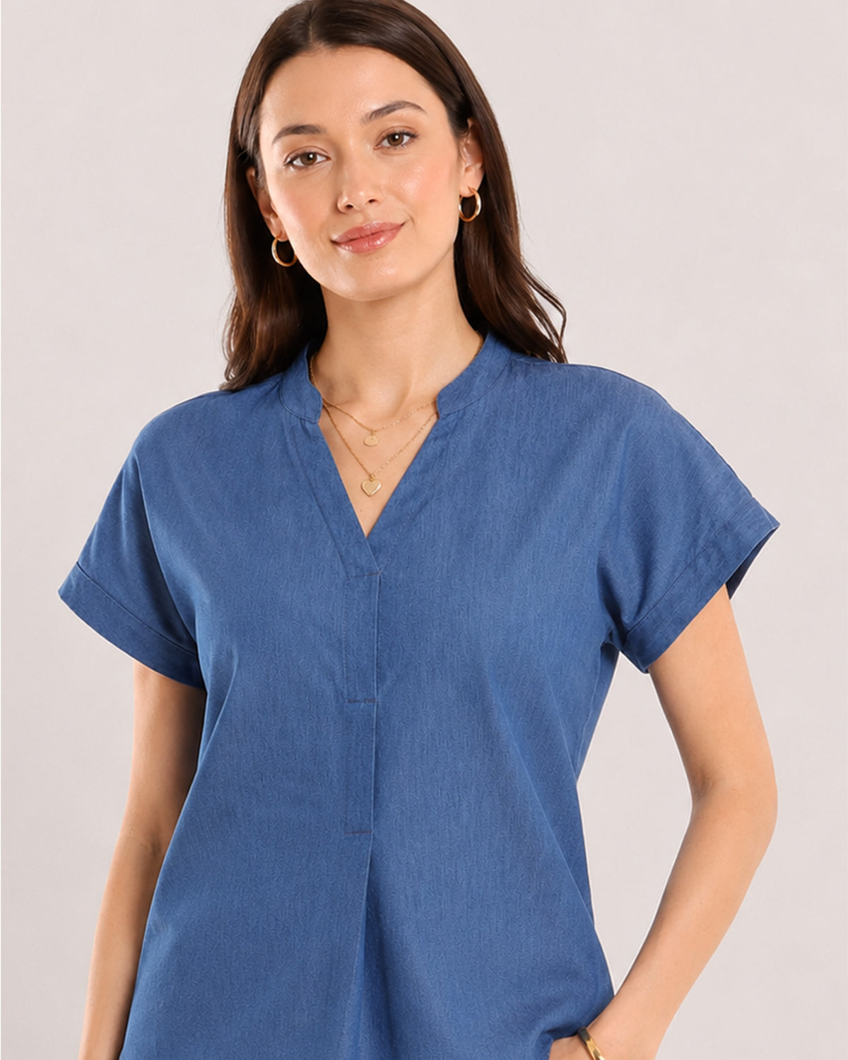 Cora indigo blue cotton chambray top front detail with extended shoulder cuffed sleeves