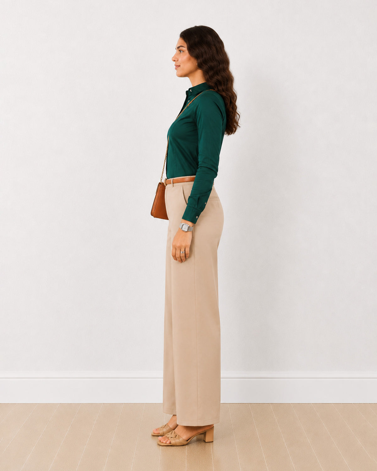 Dame bottle green tailored shirt with a fitted silhouette and full sleeves, side profile view