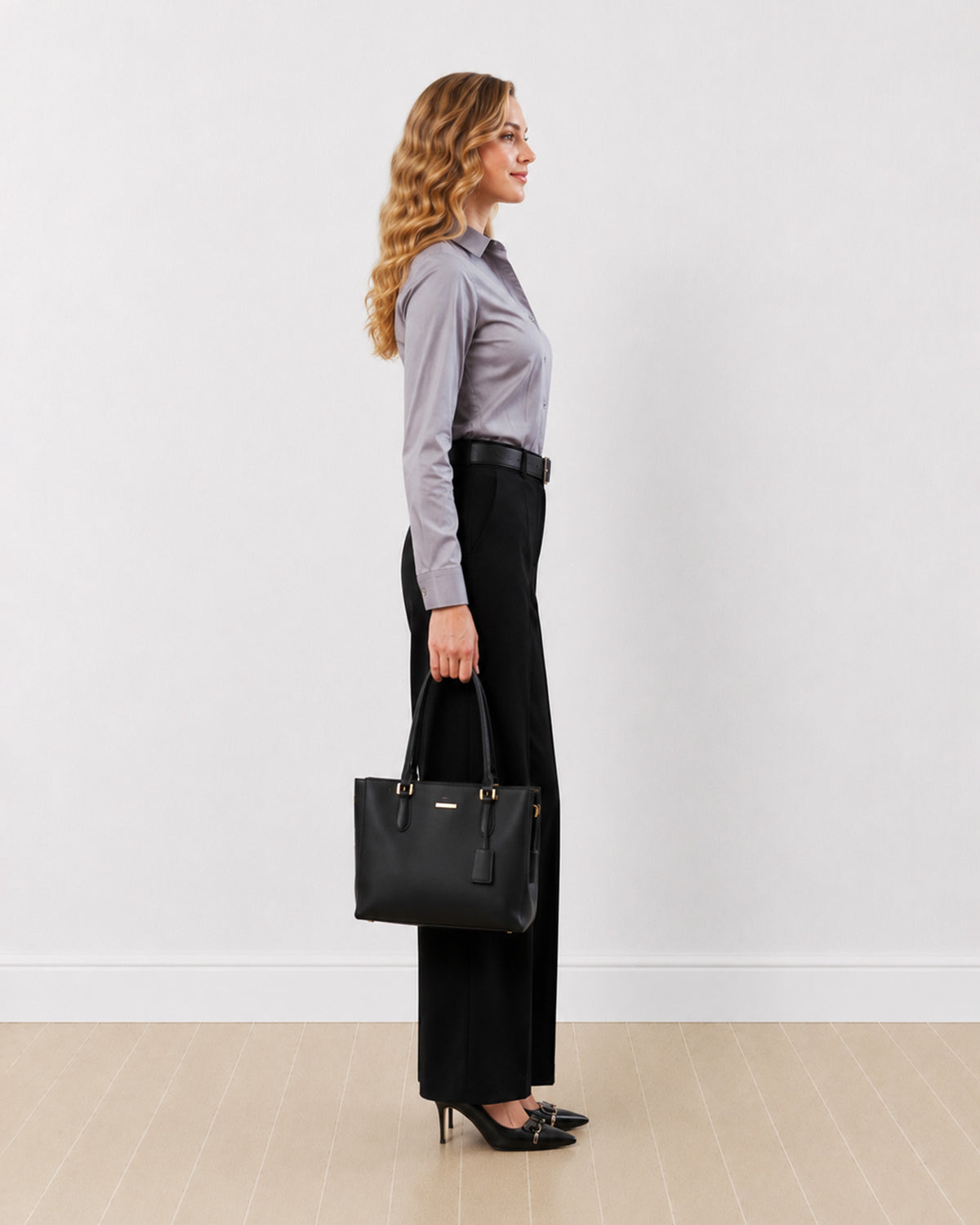 Dame steel grey tailored shirt with a slim fitted silhouette, side profile view