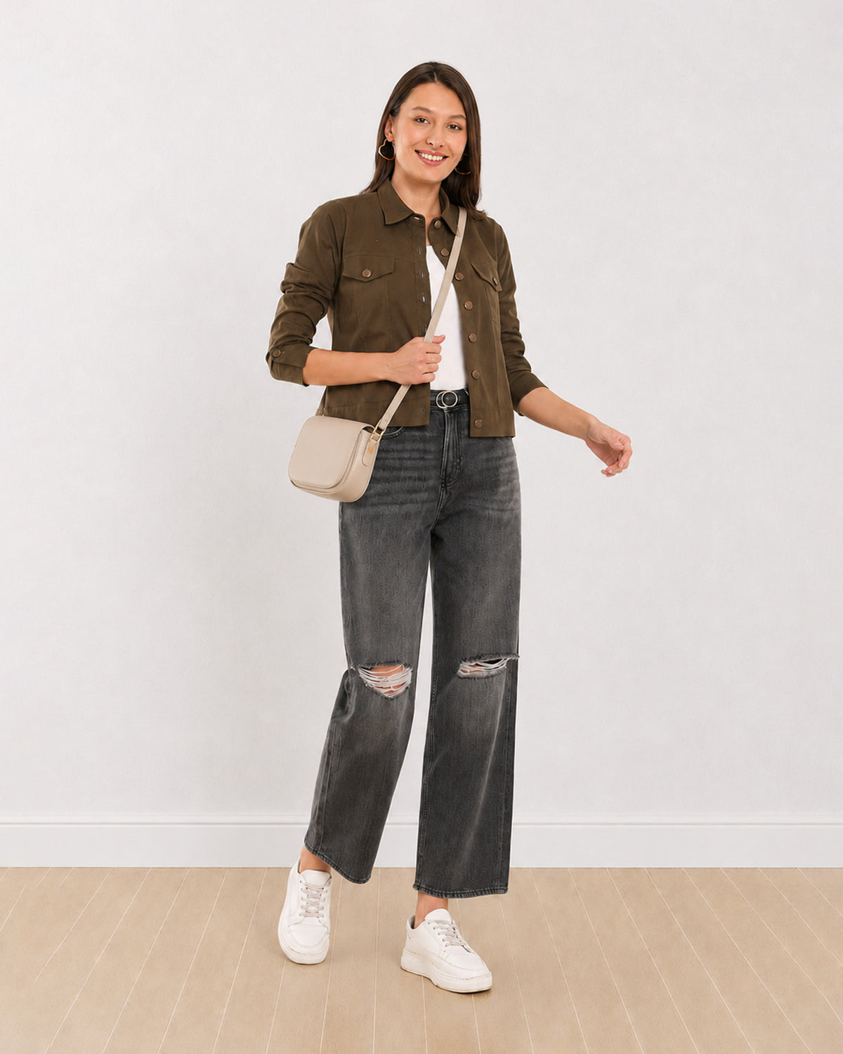Dani olive green cotton twill cropped trucker jacket with a button front, angled front view