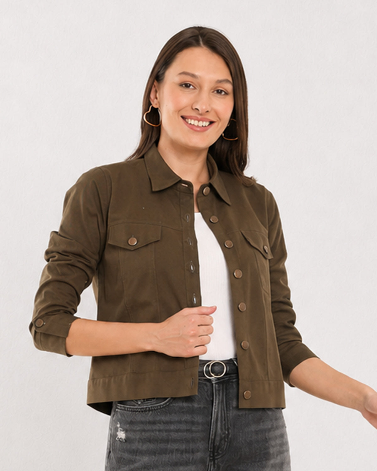 Dani olive green trucker jacket worn open showing the flap pockets, front view