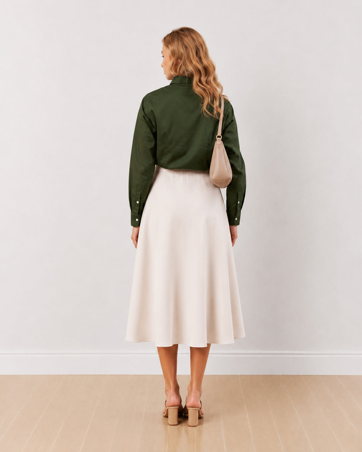 Darleen olive green formal shirt, back view showing the back waist darts and buttoned cuffs