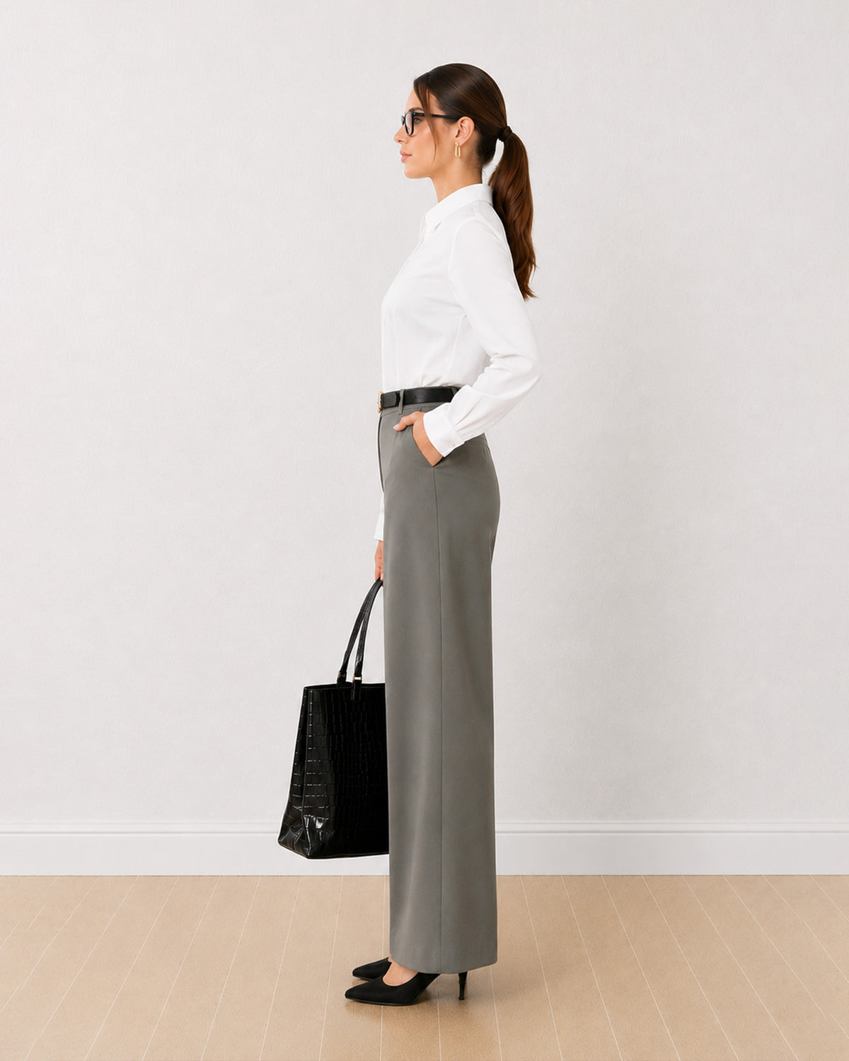 Darleen white tailored shirt with a curved hem and full sleeves, side profile view