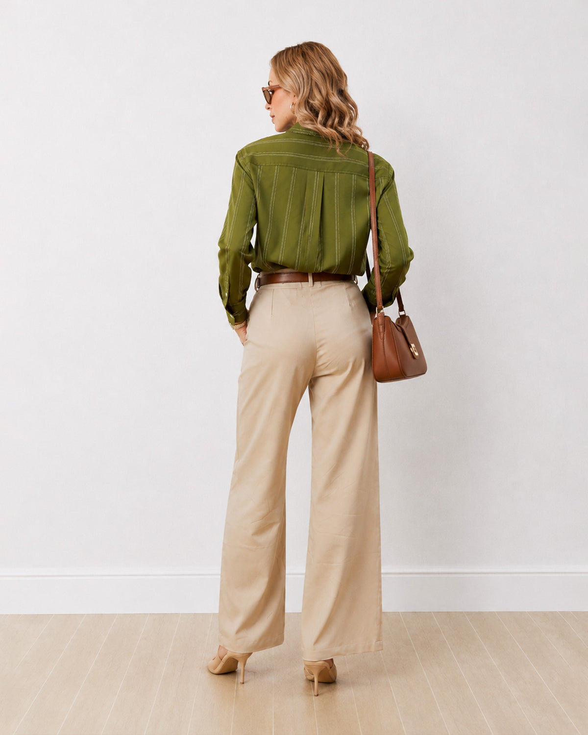 Darlina olive green striped shirt, back view showing the shoulder yoke and striped back