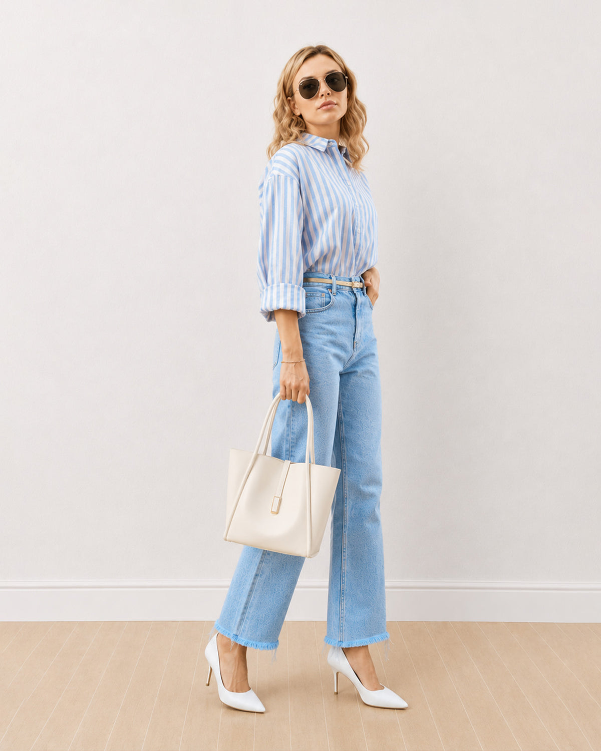 Darryl pink and blue striped shirt with a relaxed drop shoulder fit, angled front view