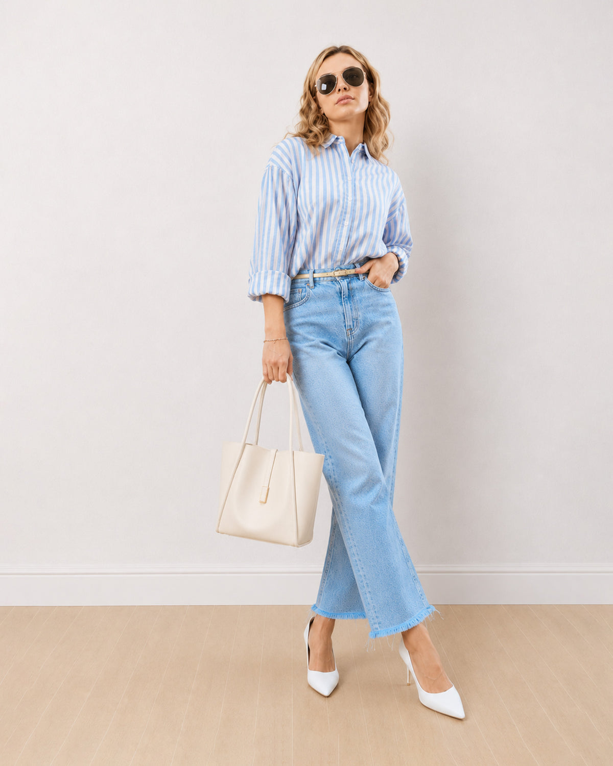 Darryl pink and blue striped shirt with a button placket and sleeves rolled back, front view