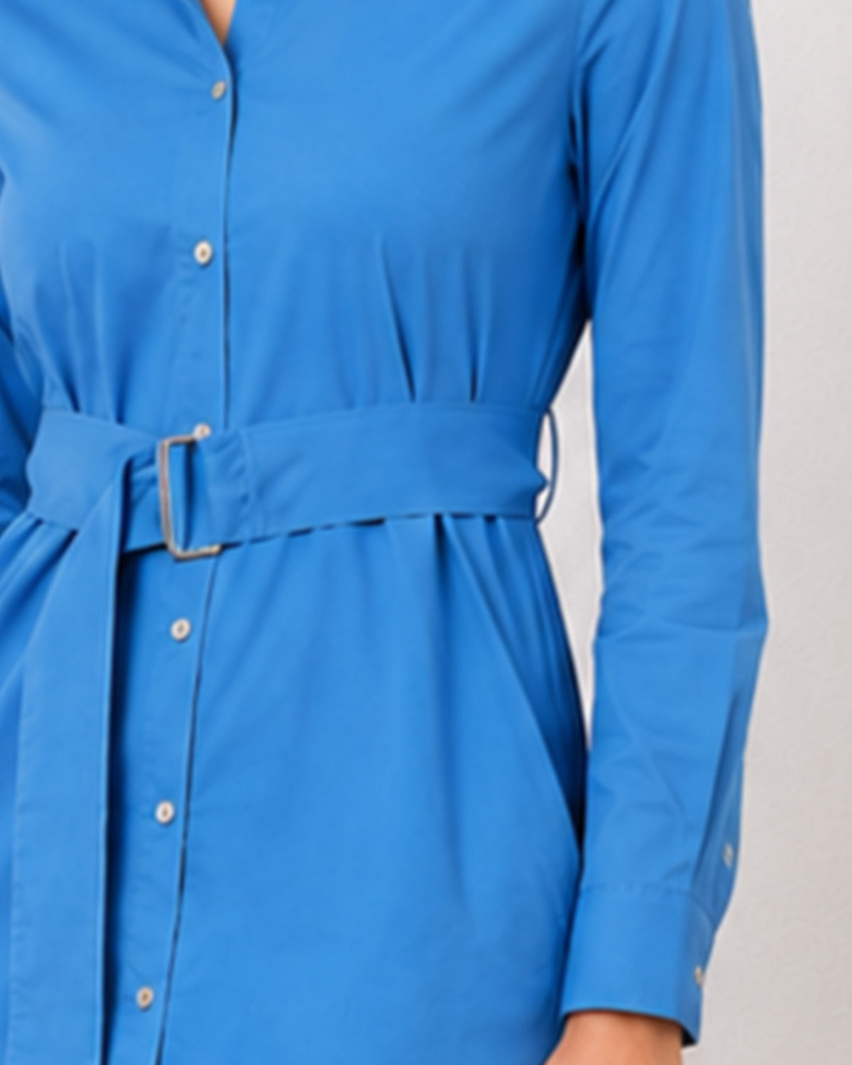 Demi bright blue shirt dress detail, self belt buckle at the waist and button cuff