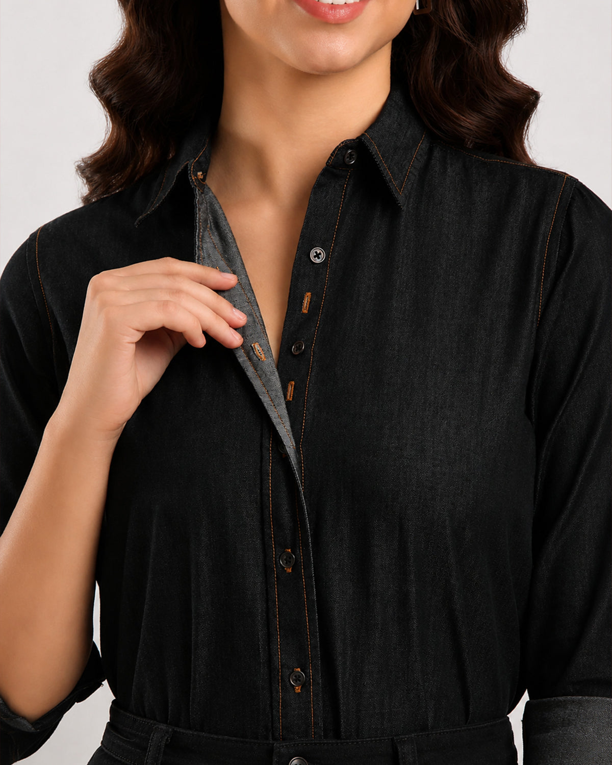 Desire black denim shirt detail, hidden dignity buttons inside the button placket