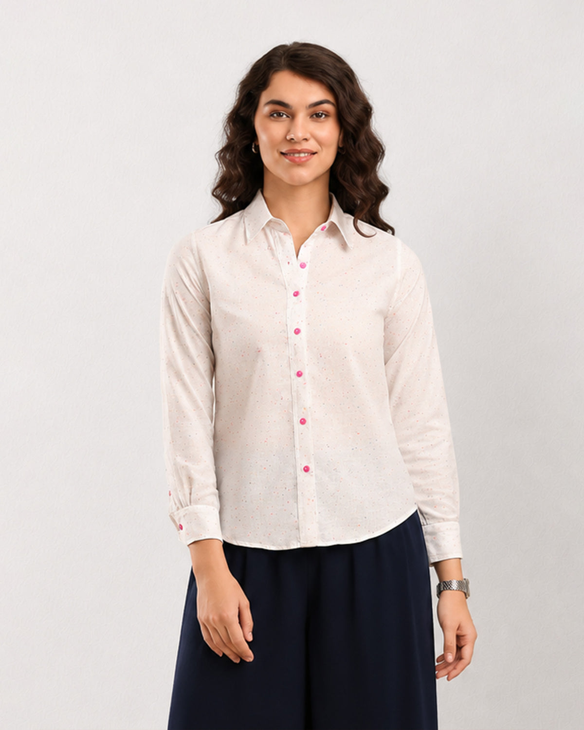 Dew multi-colour splatter print shirt, waist up front view with contrast pink buttons