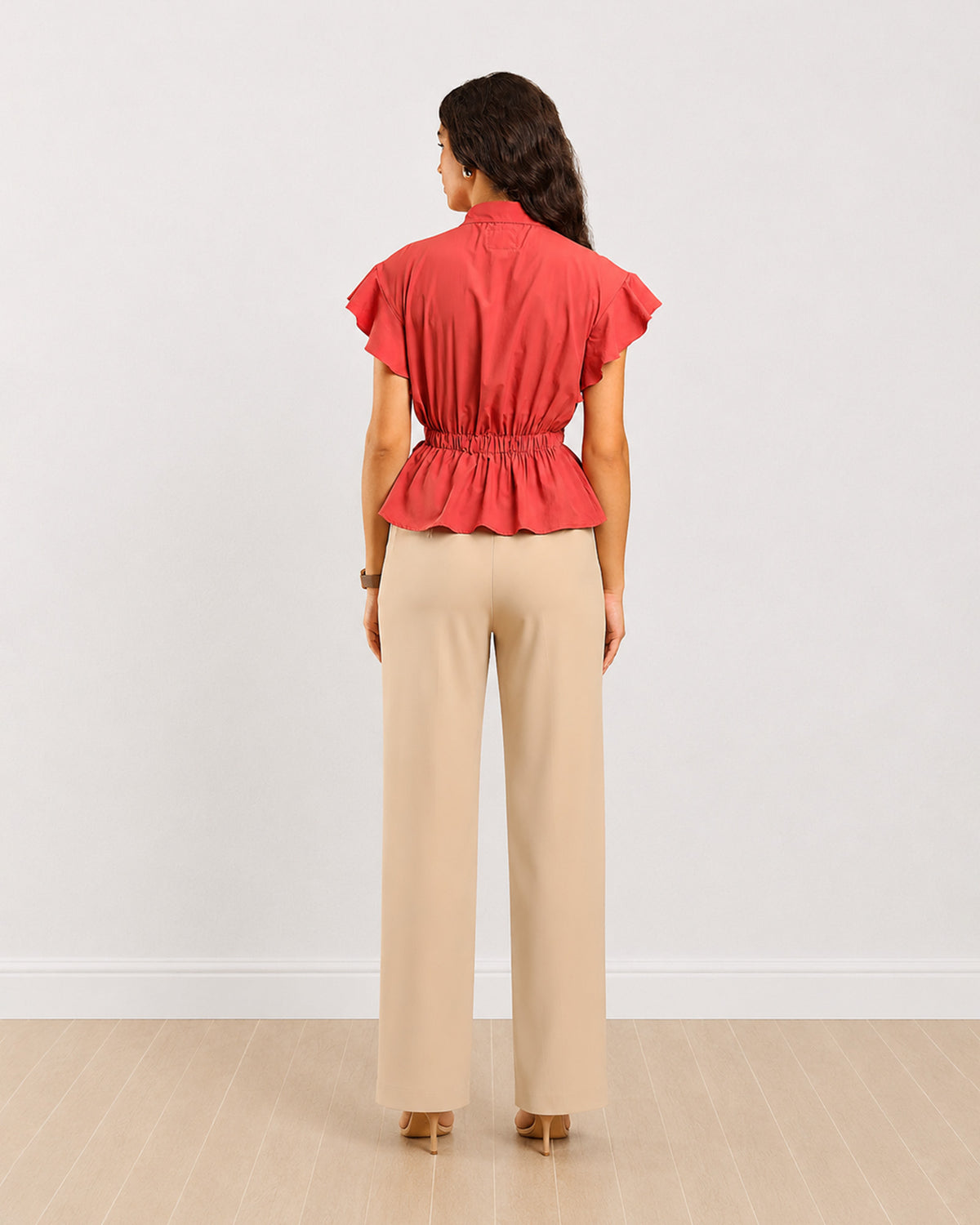 Diamond brick red flared sleeves peplum shirt, back view of the elasticated peplum waist