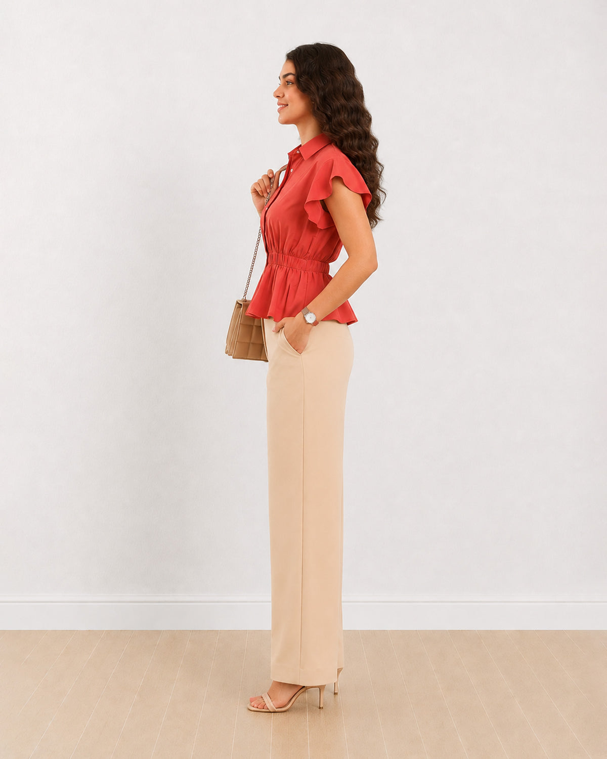 Diamond brick red 100% polyester peplum shirt, side profile view of the cropped length