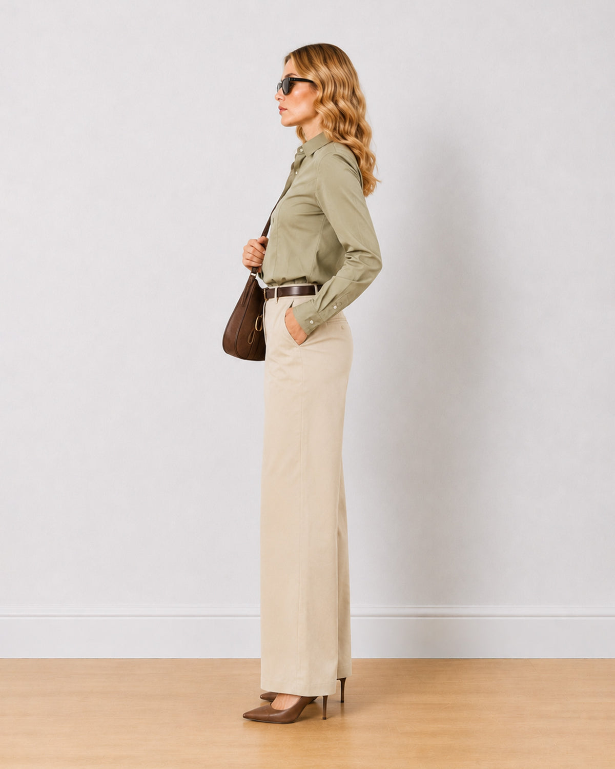 Diane beige formal trousers, side profile view of the full length wide leg