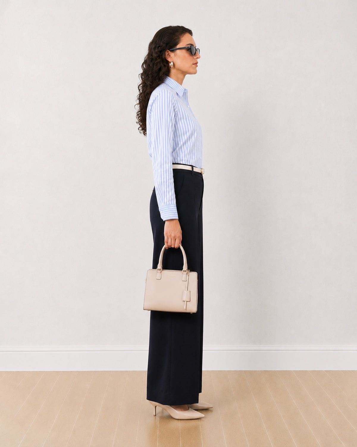 Diane navy blue formal trousers, side profile view of the full length wide leg