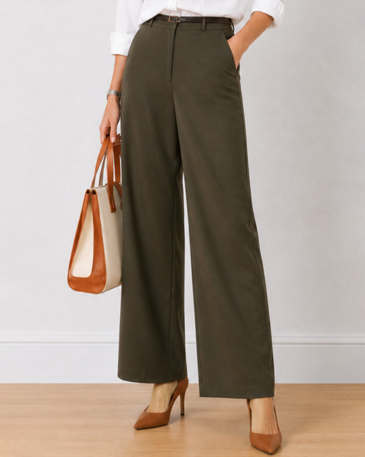Diane olive green formal trousers, waist down front view with hand in side cross pocket