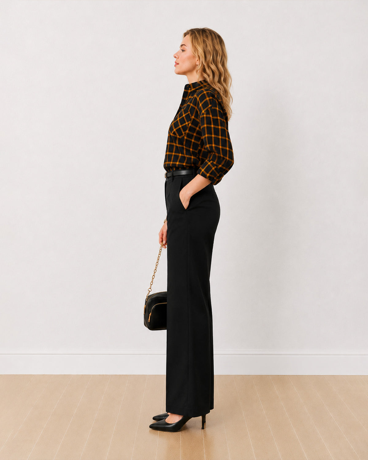 Dimona black and orange checked shirt, side profile view of the long curved hem