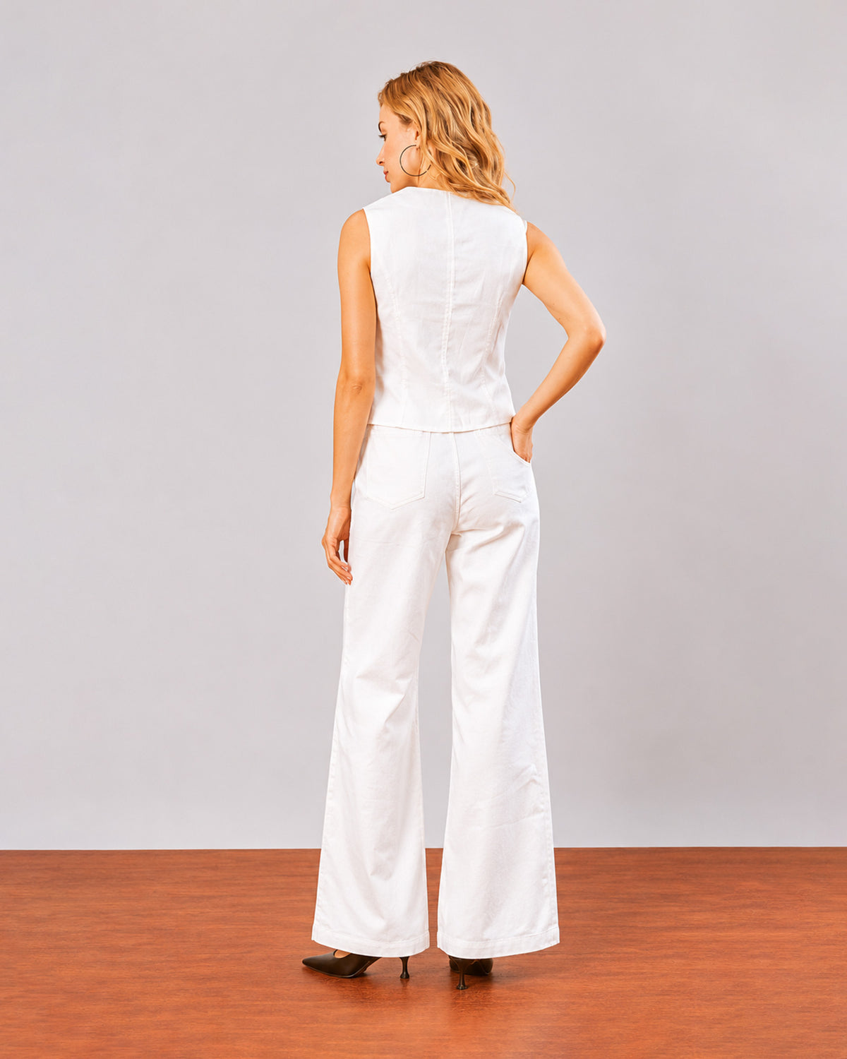 Dina white sleeveless vest and trousers co-ord set, back view