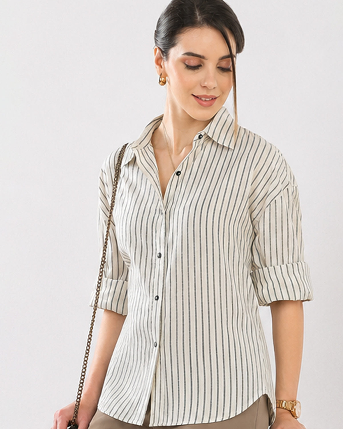 Close-up of Empathy black and ivory shirt button placket and dignity buttons