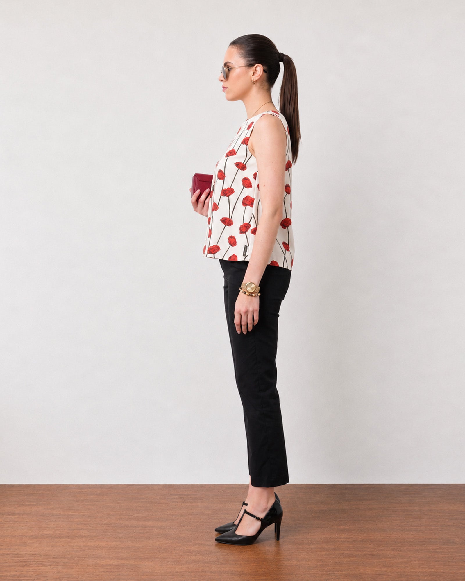 Gaya red and white floral print cotton top, side profile with a relaxed A-line fit
