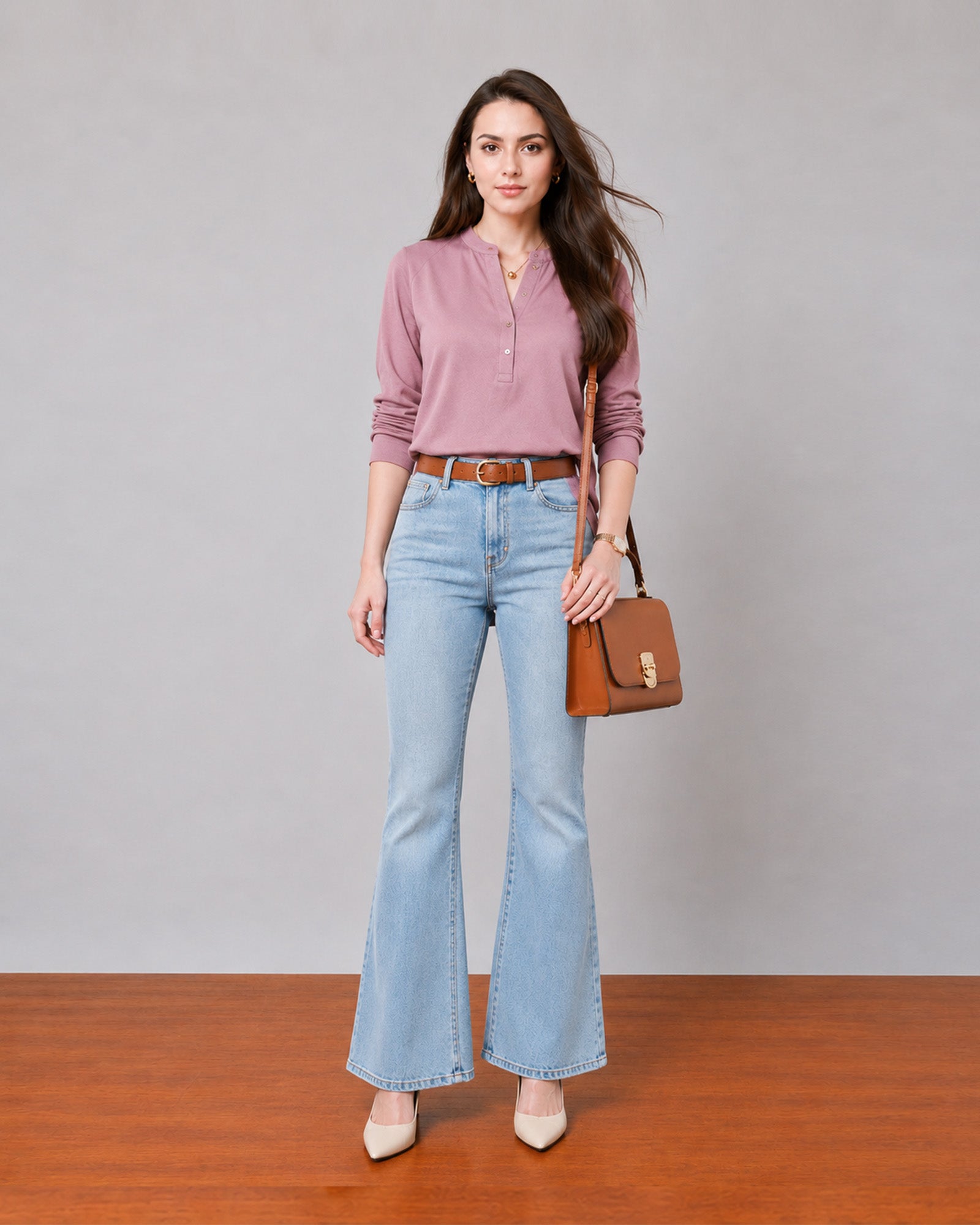 Gemini rose pink linen tunic top with a band collar and button placket, angled front view