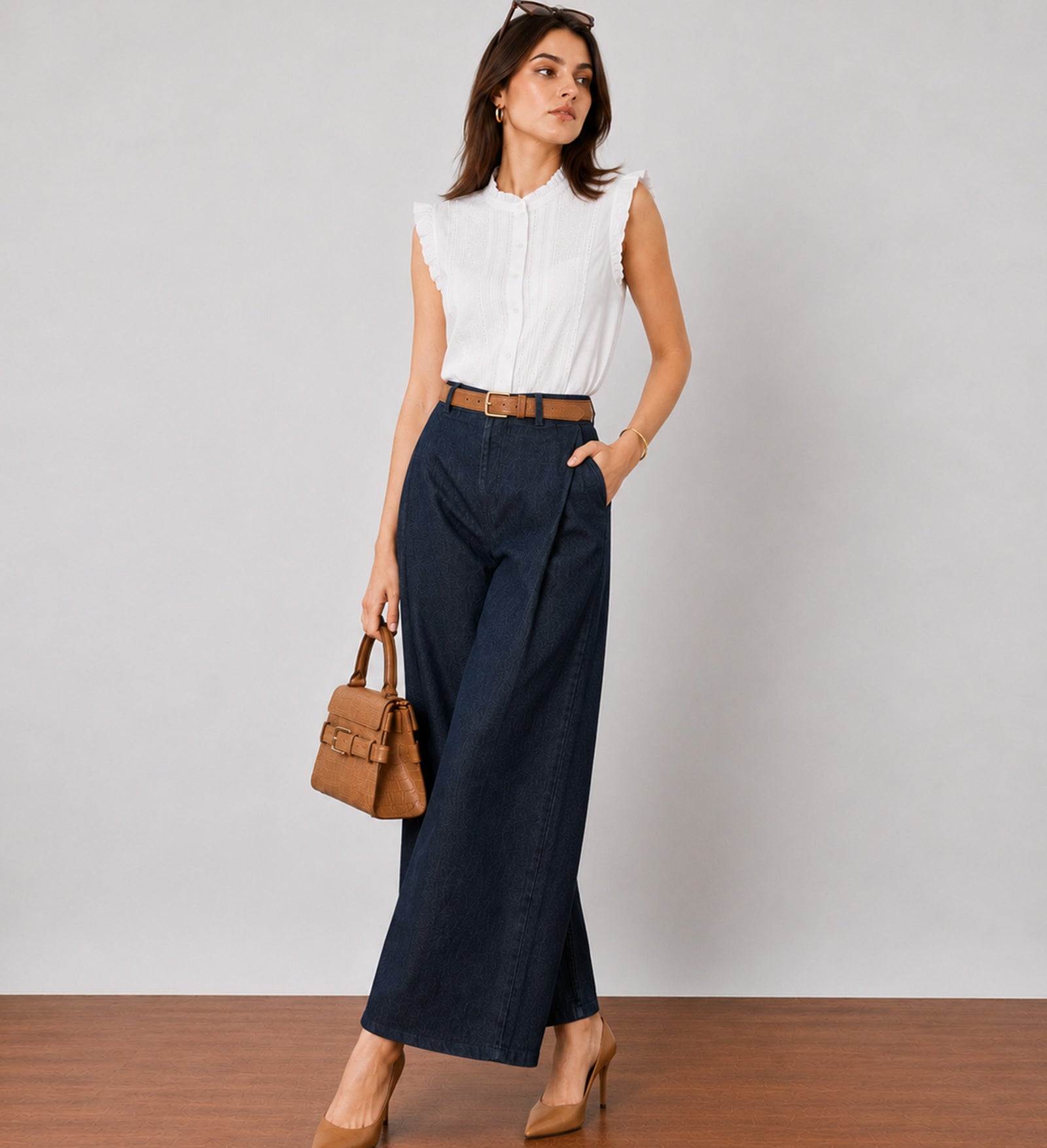 Gigi indigo blue denim pants with a wide barrel leg, walking view