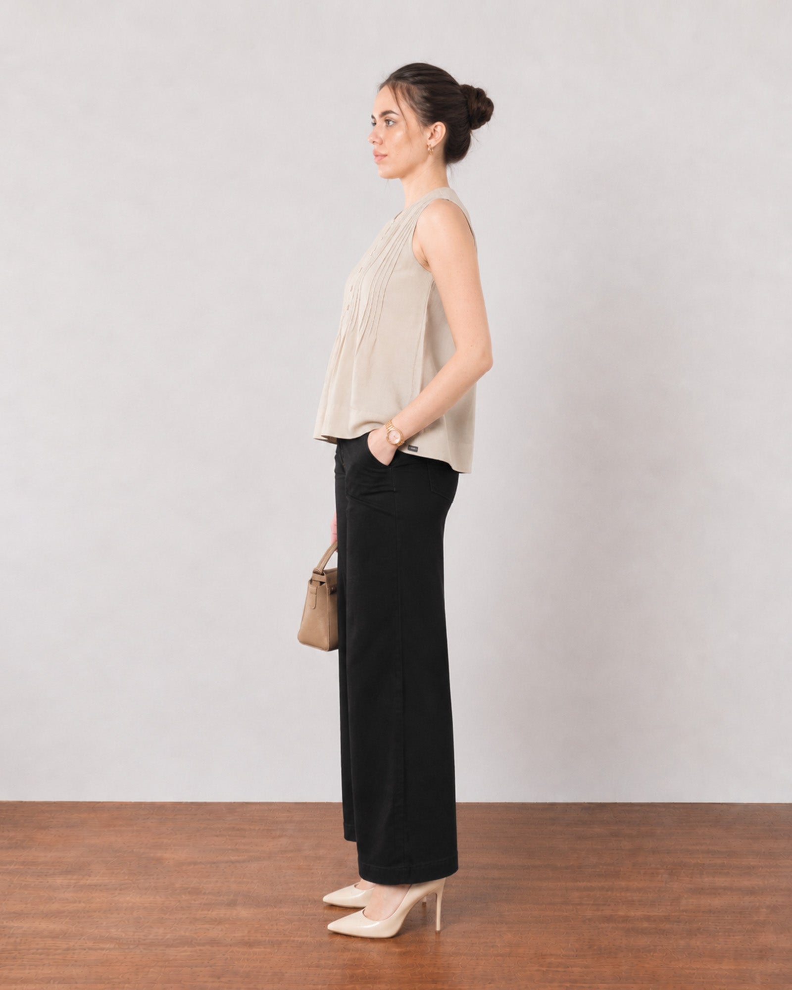 Gill beige breathable lyocell linen top, side profile showing the broad flared hem