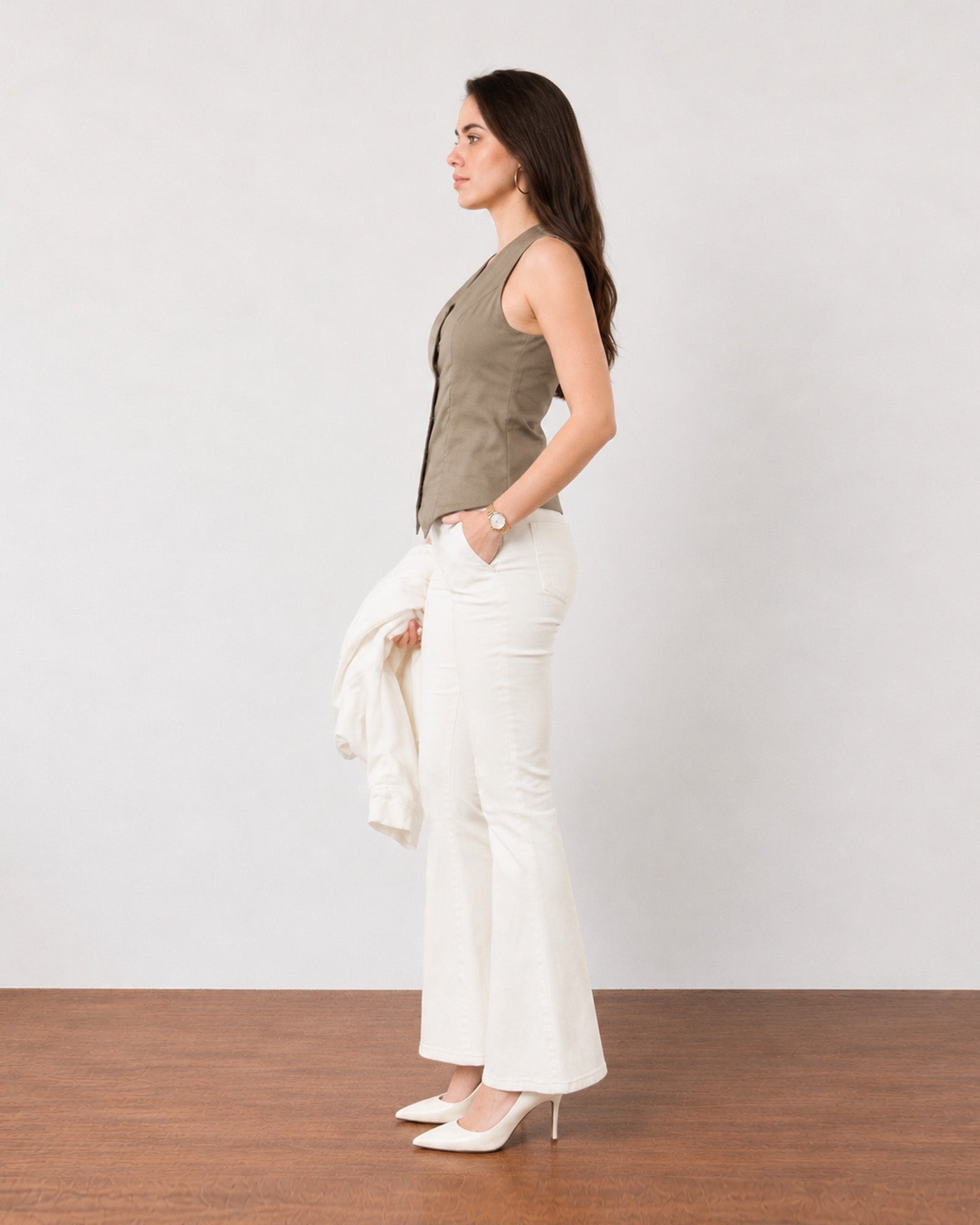 Ginger muddy brown breathable linen vest, side profile showing the fitted waist and hem