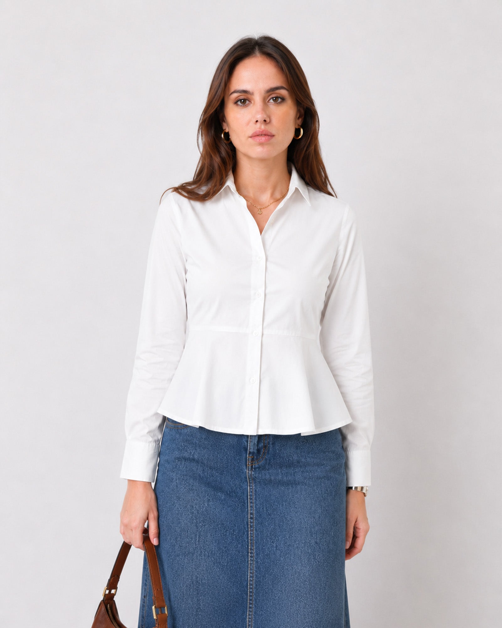 Giselle white peplum shirt with a full button-down front and flared hem, front detail