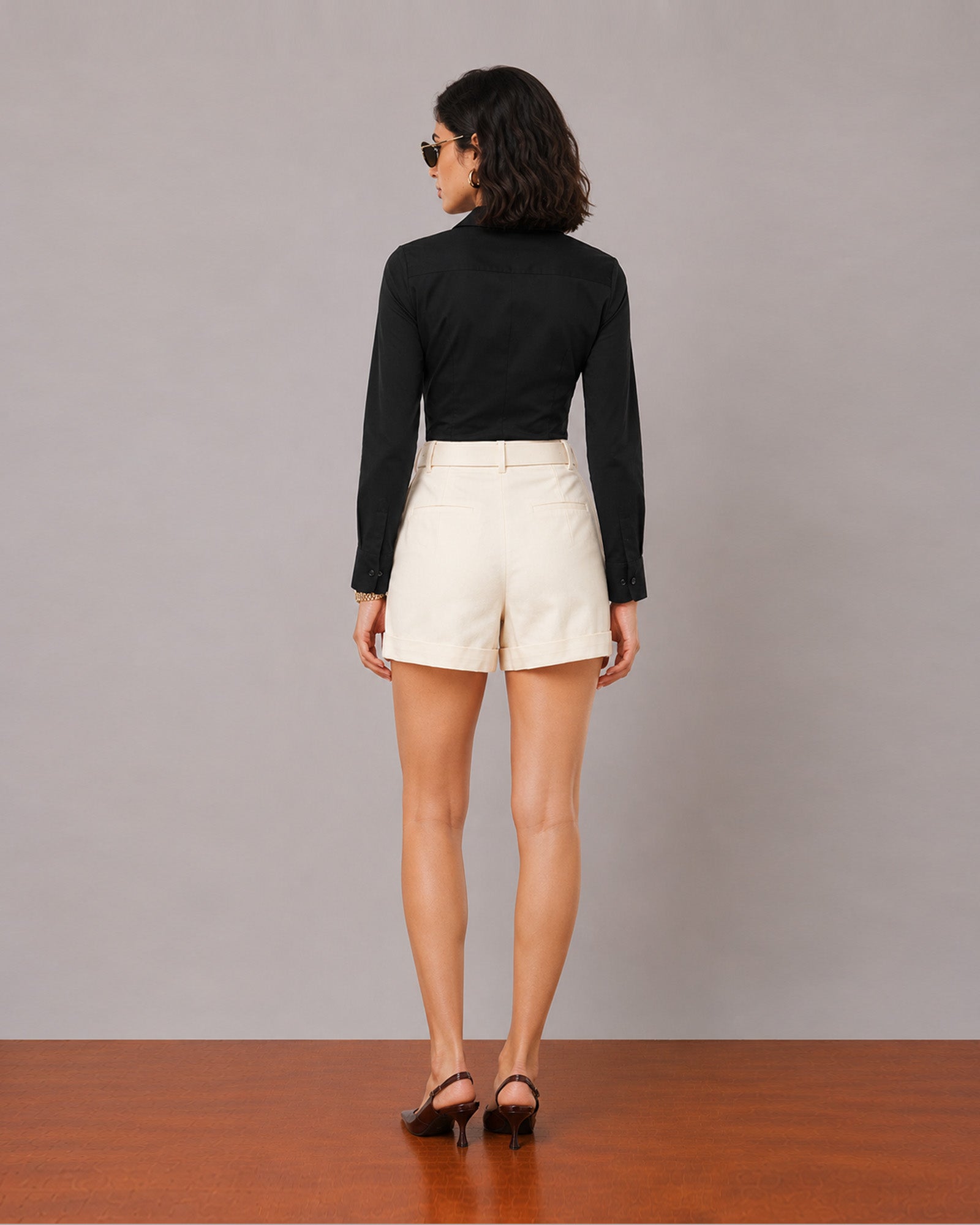Goldy beige double pleated linen shorts with full cambric lining, back view